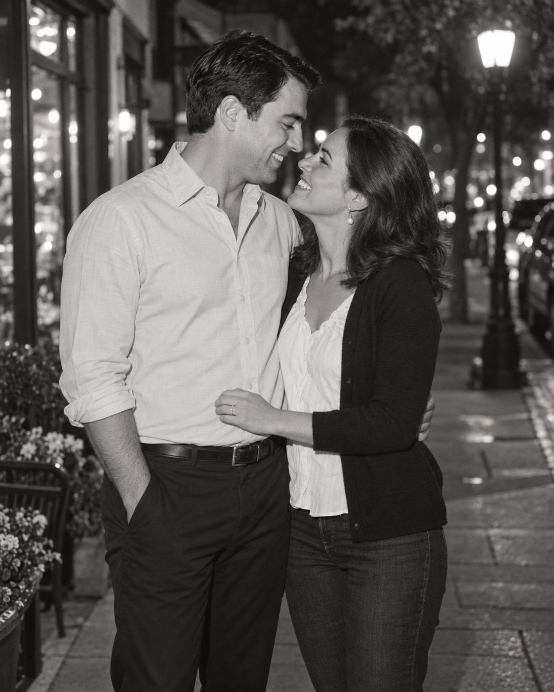 John and Mary on an evening street, Mary wearing her engagement ring